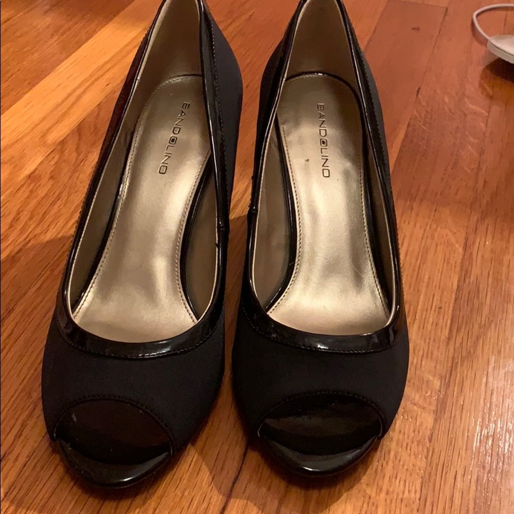 Never Worn black wedge-heeled pumps